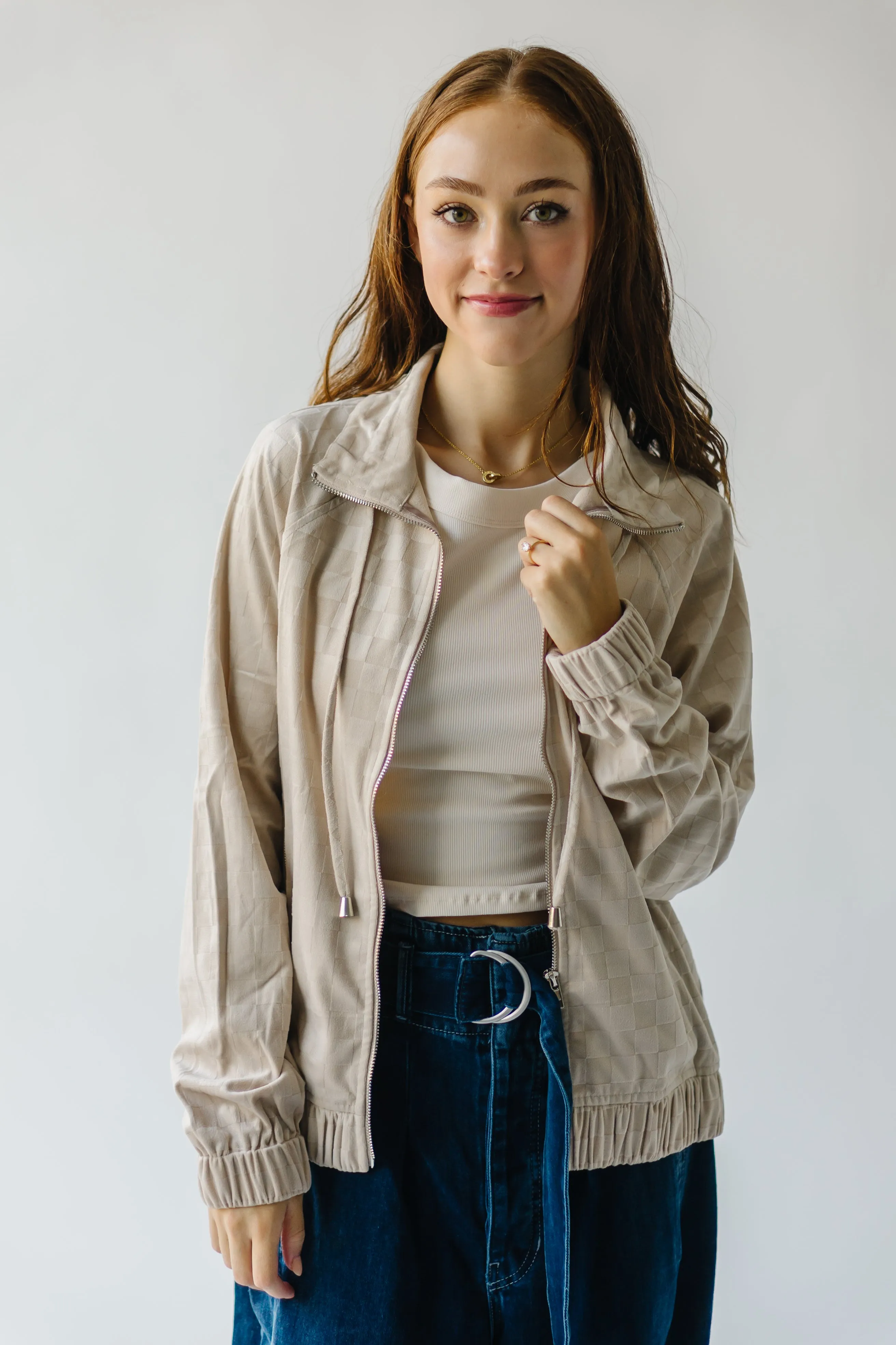 The Odon Checkered Velvet Bomber Jacket in Taupe